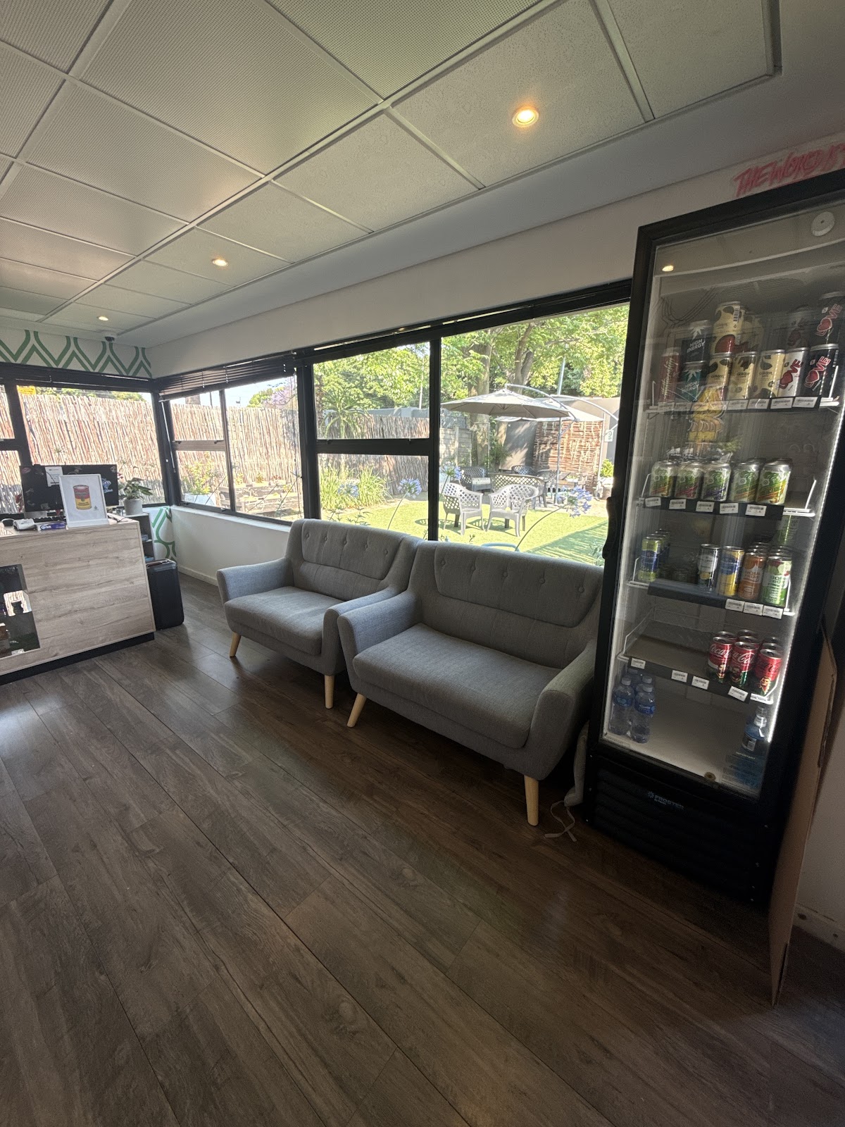 Seating and drinks fridge in the Cannafrica Fairmount lounge